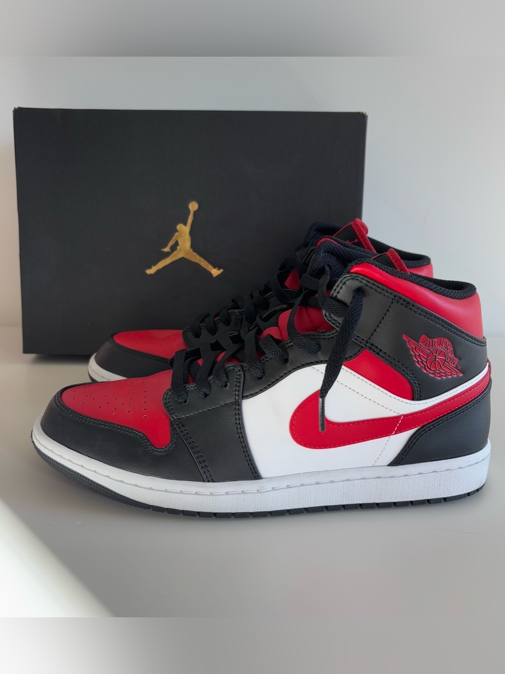 Jordan 1 Men's Mid Black/Red/White Sneakers